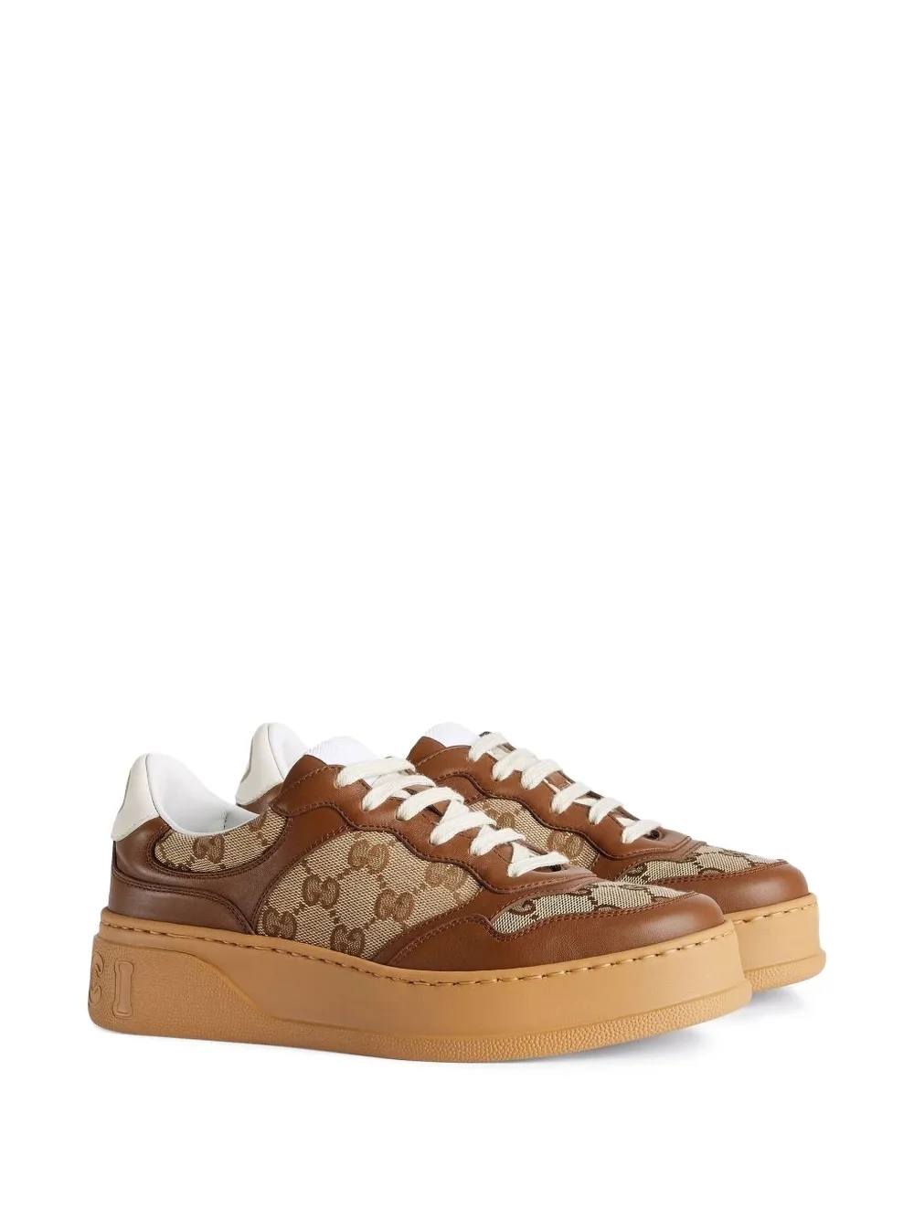 Gucci GG embossed low-top sneakers side angle
